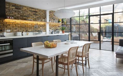 Dark Modern Kitchen With Crittall Windows And Herringbone Wood Floor