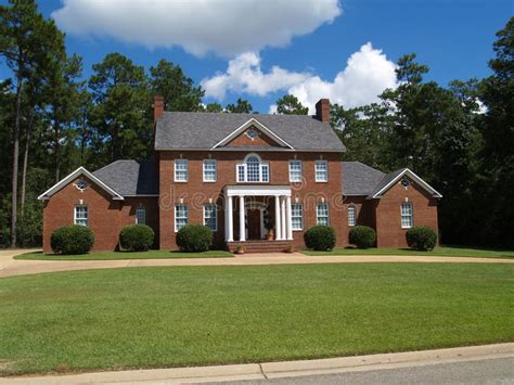 Red brick house with tile roof. Large Two Story Brick Residential Home Royalty Free Stock ...