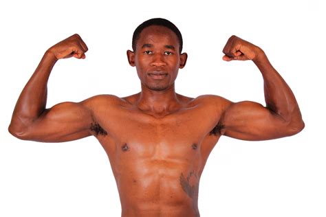 Athletic Man Flexing Biceps And Ab Muscles
