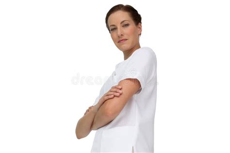 Portrait Of A Confident Female Nurse With Arms Crossed Stock Image
