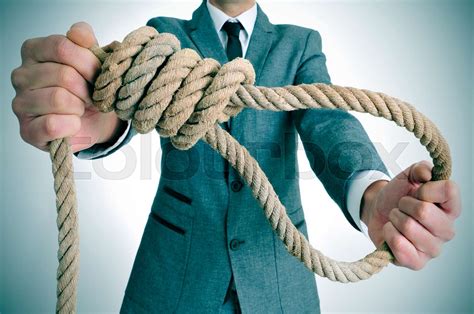 Man In Suit Holding A Rope With A Hangmans Noose Stock Image Colourbox