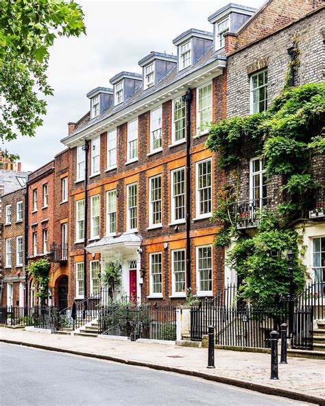 A Beautiful Row Of Brick Houses In Londons Richmond Click Through For