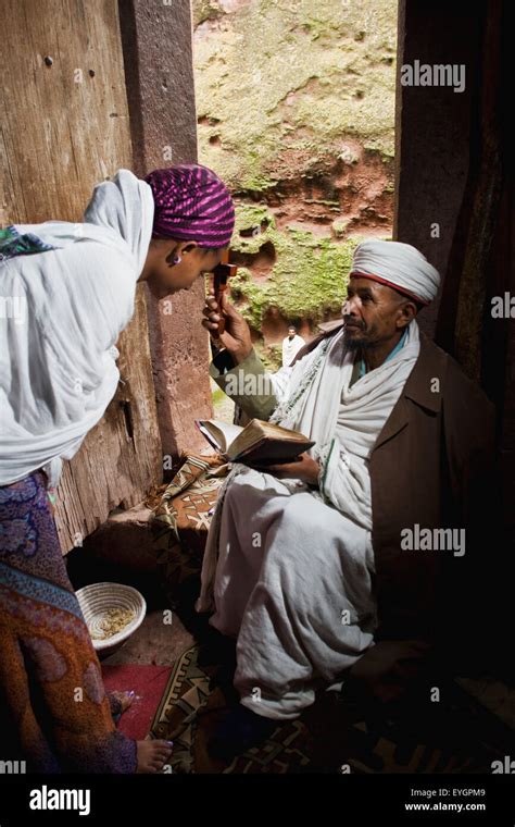 Ethiopia Ethiopian Orthodox Priest Blesses A Pilgrim Lalibela Stock