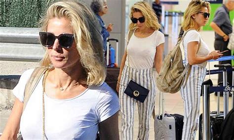 Elsa Pataky Keeps It Casual In Striped Trousers And A Tee In Madrid