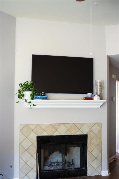 How To Decorate A Mantel With A Television Love And Renovations