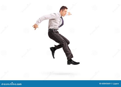 Young Businessman Jumping In The Air Stock Image Image Of Movement