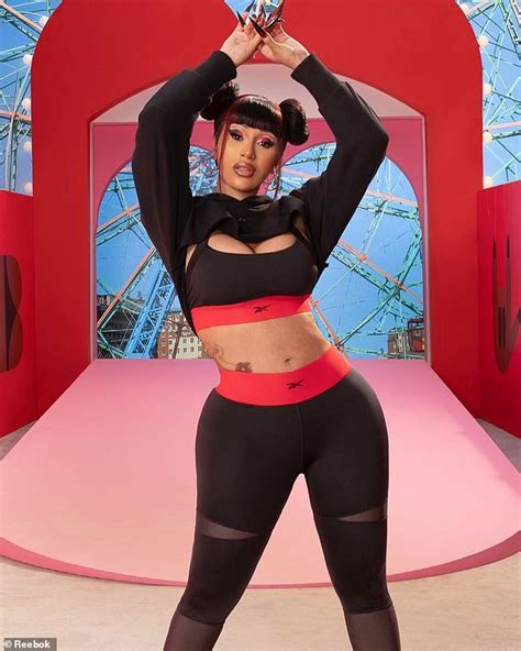 cardi b flashes her flat abs and full chest while modeling 90s chic collaboration with reebok
