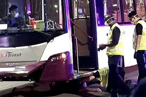 • police investigations are ongoing. Man trapped under SBS Transit bus after getting hit ...