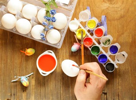Coloring Easter Eggs Paint And Brushes Stock Photo Image Of Holding
