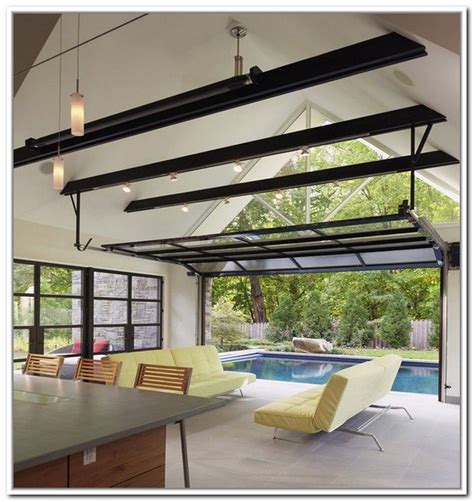 Glass Garage Doors In This Pool House By Randall Mars Architects