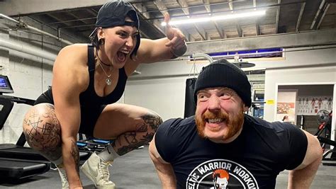 Wwe Famous Person Rhea Ripley Takes Sheamus By Her Nightmare Biceps