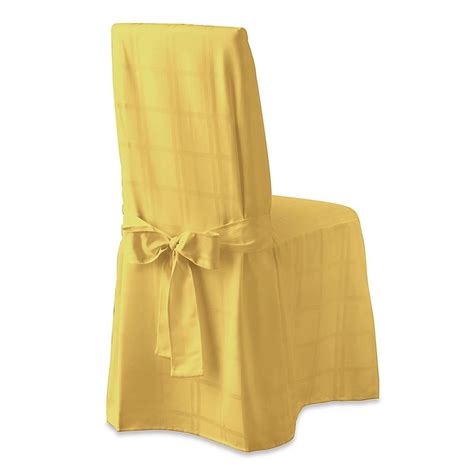 I've been staring at one of my chairs lately. Origins™ Microfiber Dining Room Chair Cover in Yellow ...
