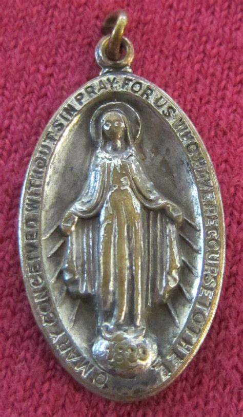 antique catholic religious holy medal miraculous old worn classic