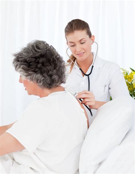 Nurse Taking Care Of Her Patient Stock Image Image Of Practitioner