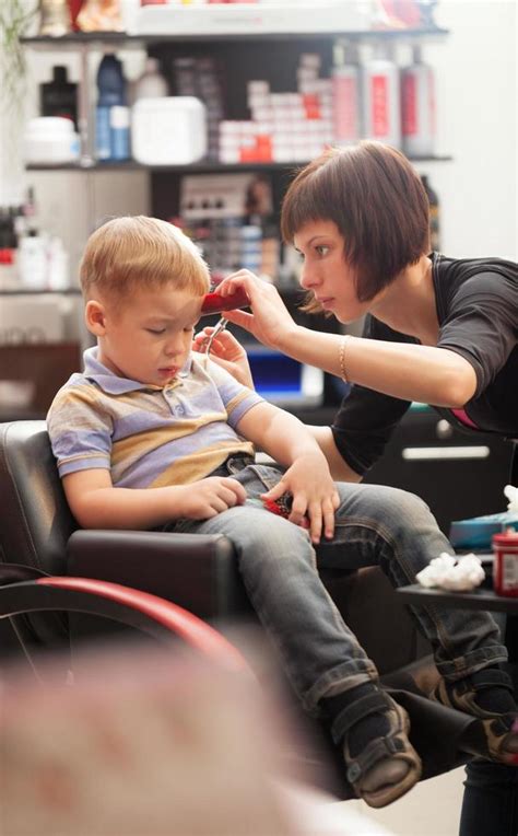 Boy Getting A Haircut In A Salon 2022305 Stock Photo At Vecteezy
