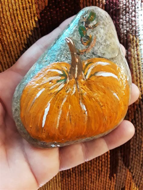 Pumpkin painted rock, by me! | Painted rocks, Rock design, Pebble art