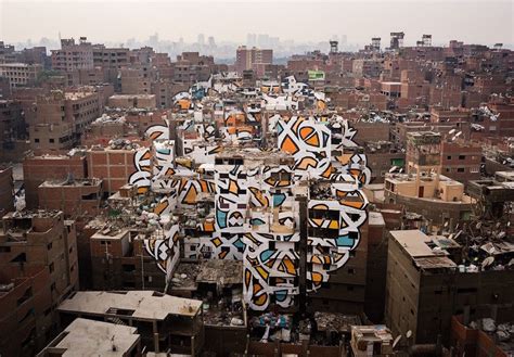 Cairo Street Art Artist Transforms Entire Neighbourhood Into Masterpiece