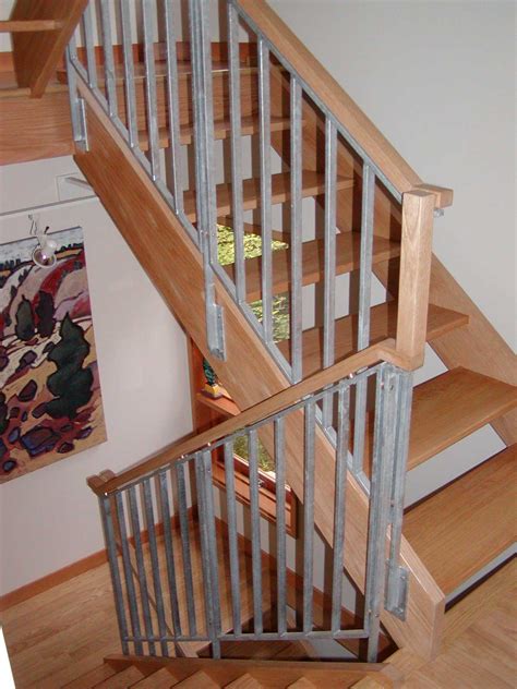 Wood handrails are a classic design and can complement just about any home style. Wood Stair Railing Ideas — Home Design By John from "Wood Stair Railing Ideas" Pictures