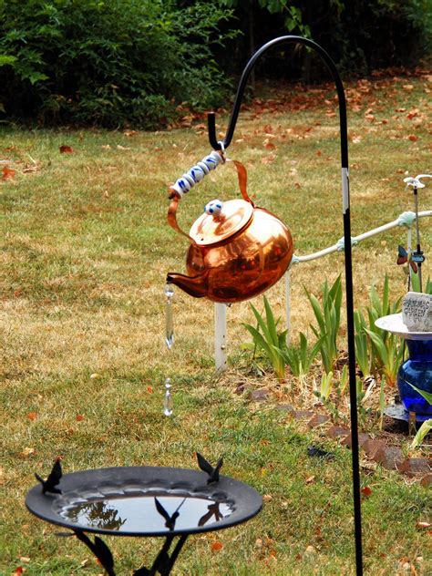 I made mine almost identical to hers except the top flat piece for the actual bath part. copper teapot spilling into the bird bath (mine) | Bird ...
