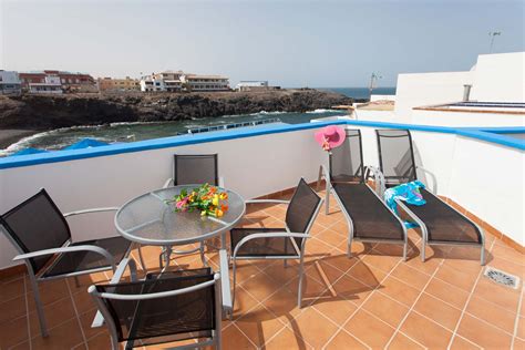 Hay tiendas, bares y restaurantes en el centro de cotillo, a 5 minutos a pie. Apartamento Pantai II de 2 dormitorios en El Cotillo