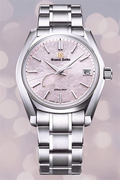 The Textured Dial Of Sbga413 Emits Subtle Tones Of Pearly White And Pink Capturing The Budding