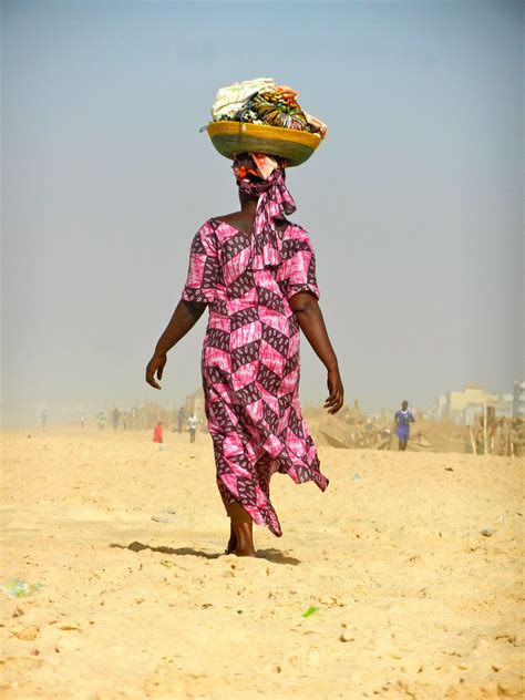 Dakar Senegal Woman Carrying Casaba Gourd Bowl On Her Head Story Of