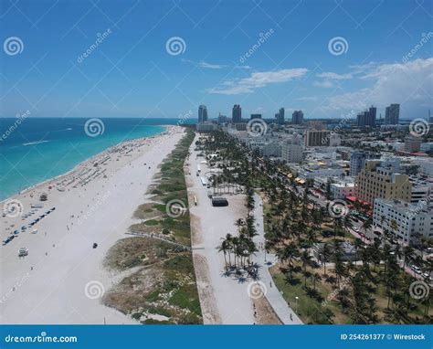 Drone View Of The Crowded South Beach With Beautiful Modern Buildings