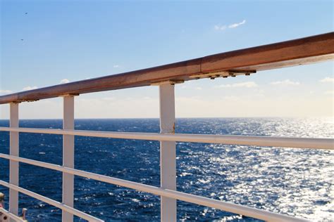 Free Stock Photo Of Ship Railing On Open Ocean And Sky