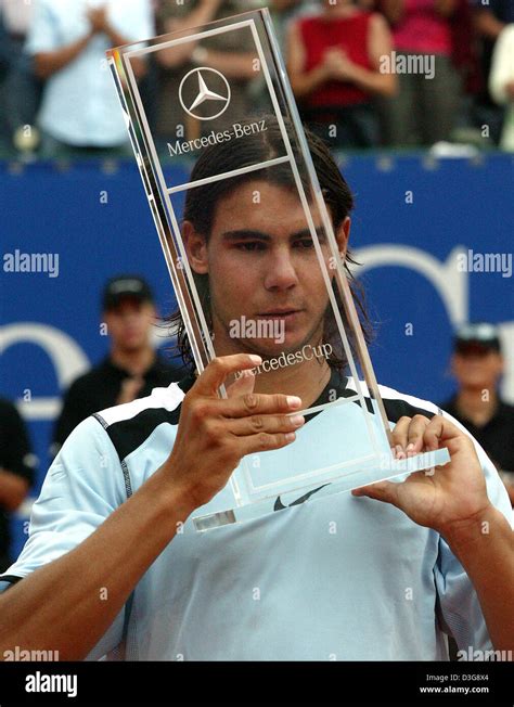 Dpa Spanish Tennis Pro Rafael Nadal Presents His Trophy After The