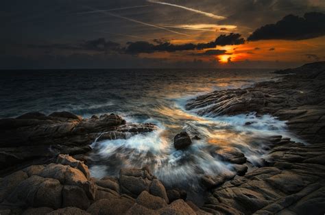 Sunset Over Rocky Sea Hd Wallpaper Background Image 2048x1361