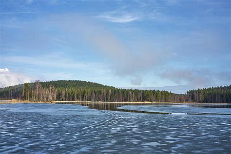 Frozen Lake Getting Unfrozen Spring In Scandinavia Photograph By