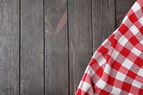 Checkered Picnic Blanket On Wooden Background Space For Text Stock