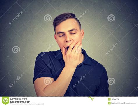 Sleepy Young Man Yawning Feeling Tired Stock Photo Image Of Hand