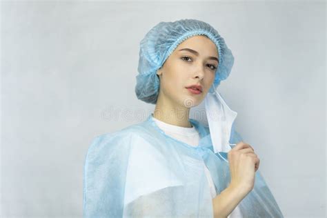 doctor or nurse taking off her medical mask portrait stock image image of infection