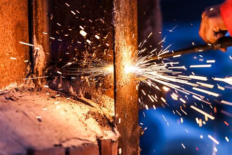 Worker Cutting Steel Board Using Metal Torch Stock Photo - Image of