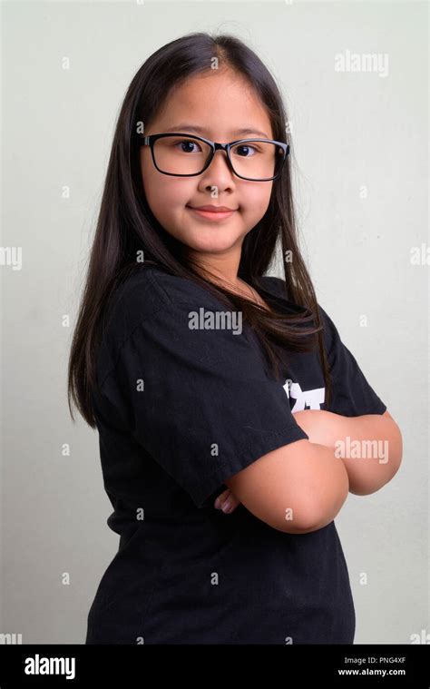 Young Cute Asian Nerd Girl Wearing Eyeglasses Stock Photo Alamy