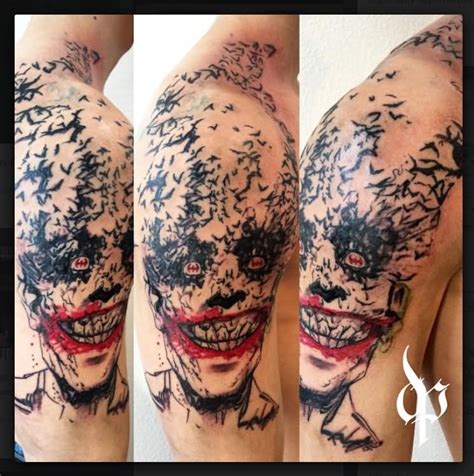 Colorful joker and batman tattoo on man upper back. Joker Tattoo Designs For Men - Wiki Tattoo