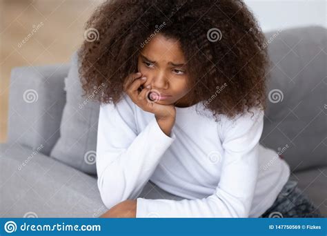 Close Up Upset African American Teenage Girl Sitting Alone