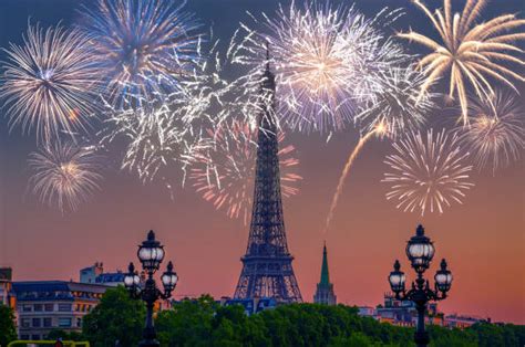 Eiffel Tower At Night With Fireworks Wallpaper