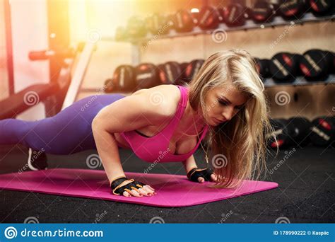 Woman Making Push Up Exercise In Gym Stock Photo Image Of Athlete