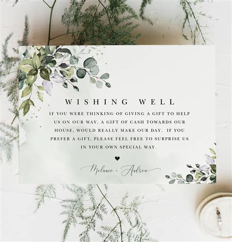 A White Card With Greenery On It That Says Wishing Well