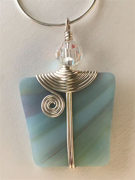 Aqua Blue Streaked Opaque Stained Glass Pendant Wrapped In Sterling