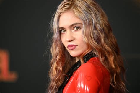 Grimes Was Told To Sex Up Her Image And Be More Like Miley Cyrus By