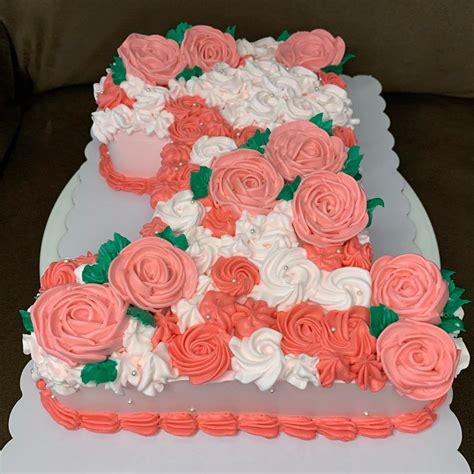 Whisk Taker Floral Themed Number Cake For The Cute Baby Facebook