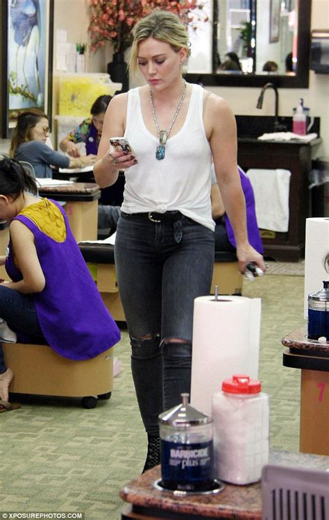Hilary Duff Showcases Her Gym Honed Figure In Skintight Ripped Jeans As
