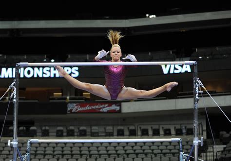 Artistic Gymnast Nastia Liukin Spreading Her Legs On The Uneven Bars
