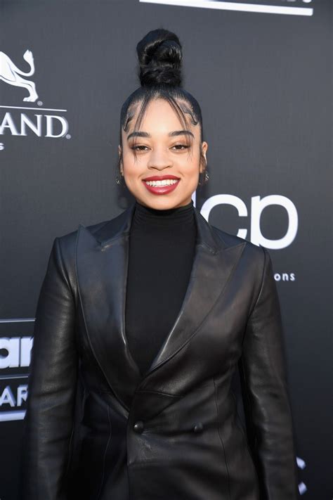 Ella Mai Steps Out With A Sky High Sculptural Bun At The Billboard