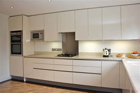 The average countertop height is 36 inches above the floor. High Gloss Acrylic Cream German Kitchen | Kitchen cabinets, Kitchen cabinet dimensions, Small ...