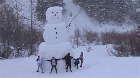 Massive Snowman Delights Passersby In Logan Canyon