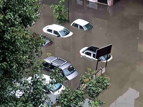 vehicles submerged under flood water in hyderabad